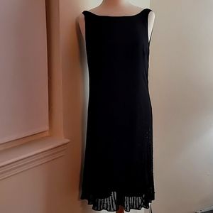 Women's long black evening dress with a sequined bottom